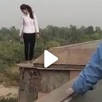 Girl jumped on the wall of Delhi's Akshardham metro station